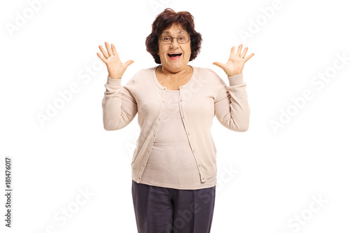 Surprised senior lady gesturing with her hands