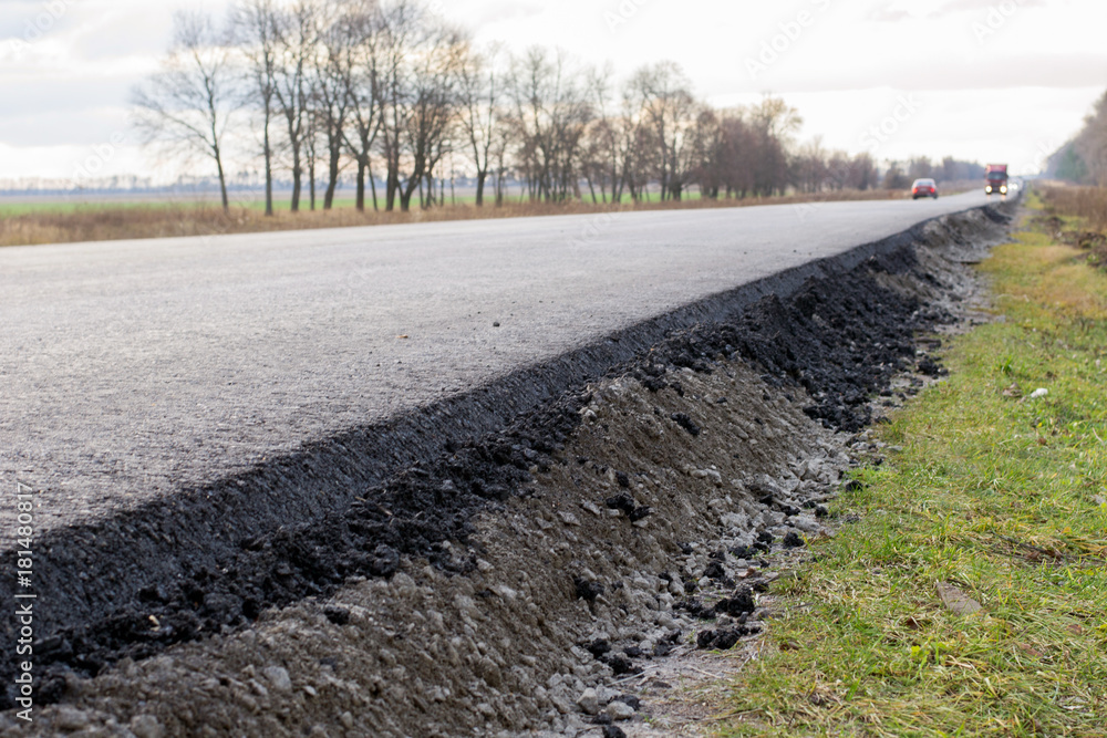 Layer of new laid asphalt, road construction Layer of new laid asphalt, road construction