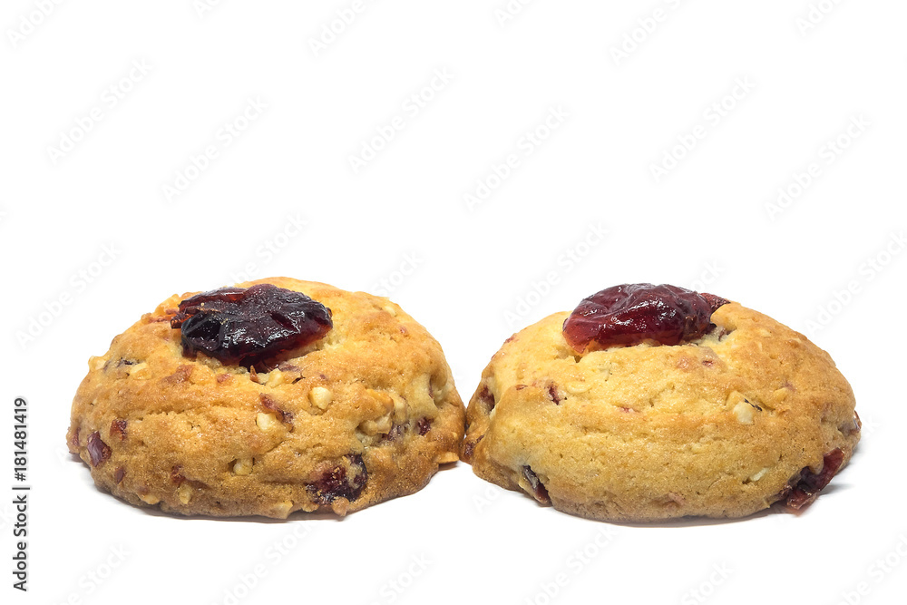 Cranberry cookie with part of cranberry on top isolated on white background Cranberry cookie with part of cranberry on top isolated on white background