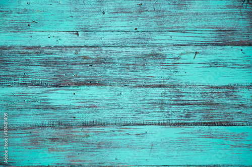 Blue color, grunge old scratched wood board textured background