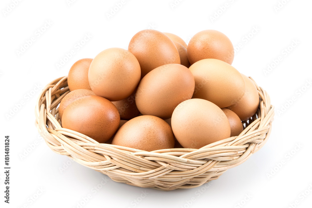 Eggs in mini rattan basket , isolated on white background Eggs in mini rattan basket , isolated on white background