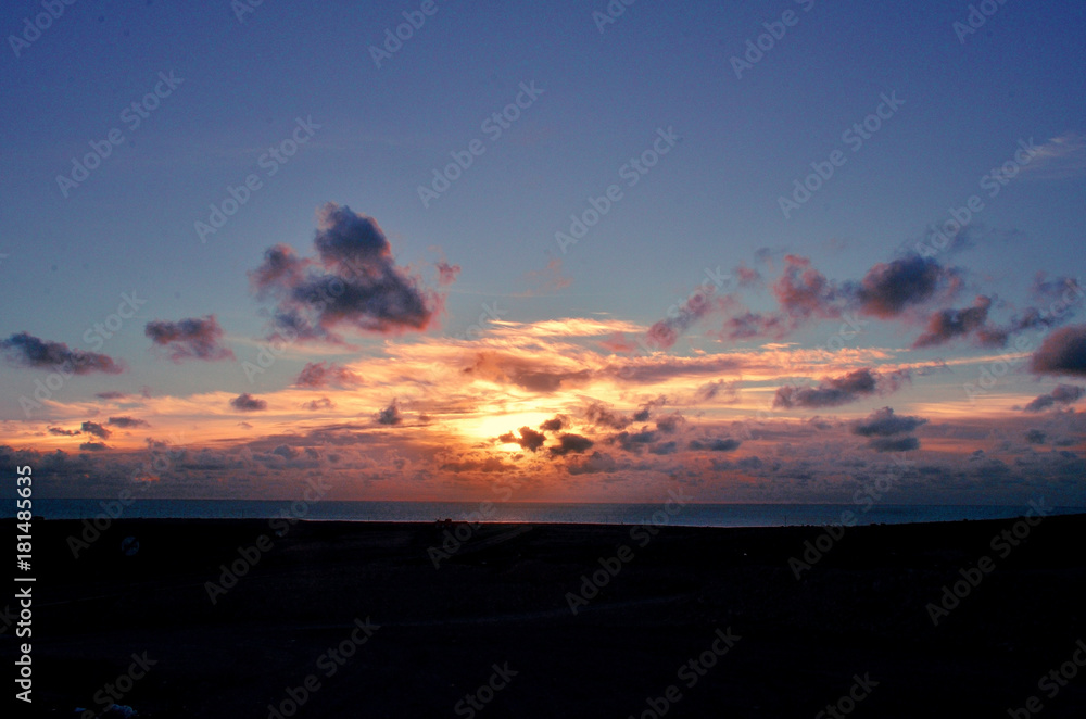 pink sunrise with clouds on the atlantic ocean pink sunrise with clouds on the atlantic ocean