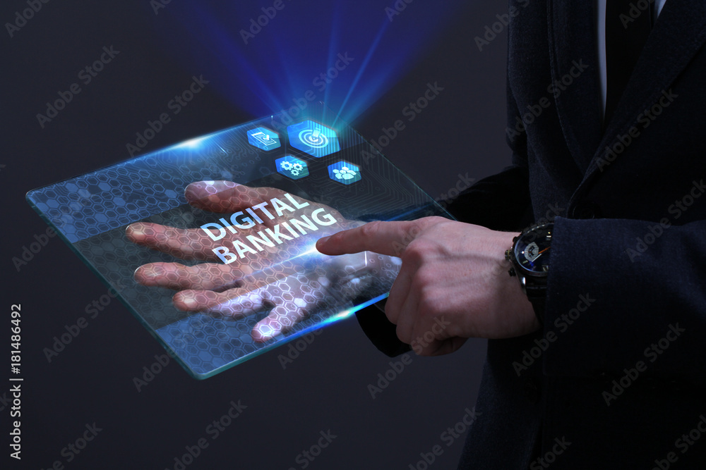 Business, Technology, Internet and network concept. Young businessman working on a virtual screen of the future and sees the inscription: Digital banking Business, Technology, Internet and network concept. Young businessman working on a virtual screen of the future and sees the inscription: Digital banking