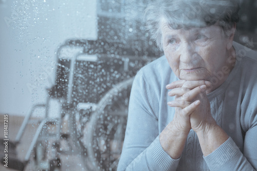 Canvas Print Disabled grandmother praying at home