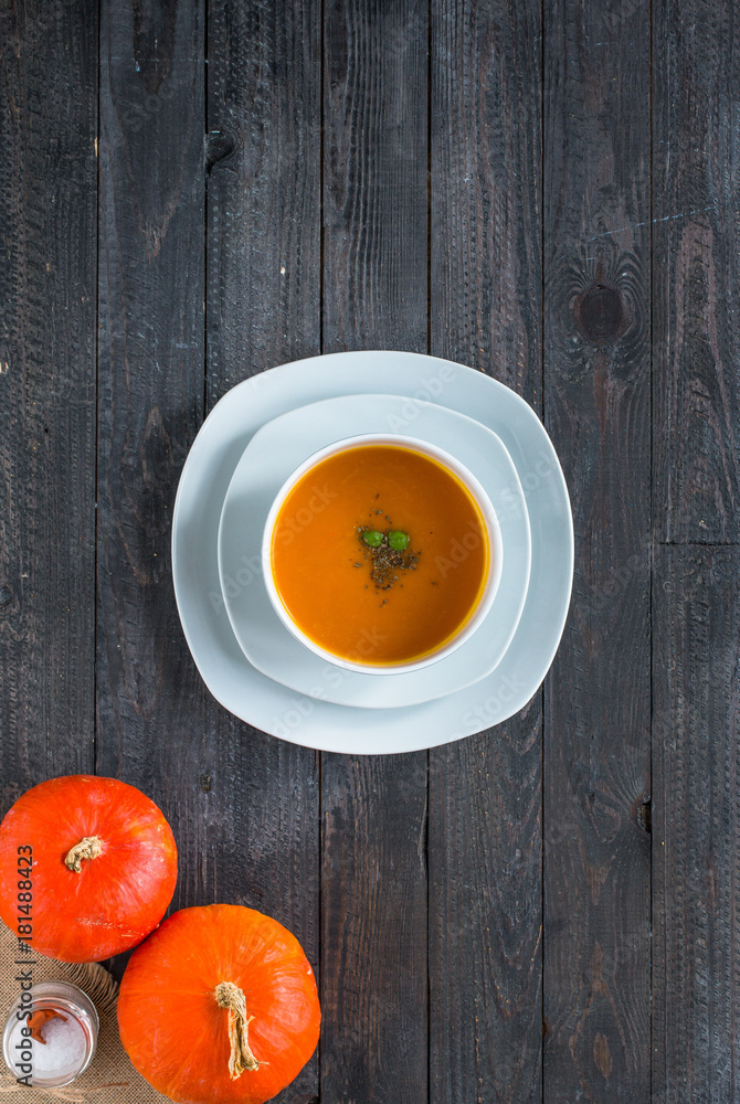 Homemade Pumpkin Soup on rustic wooden background, free space for text. Homemade Pumpkin Soup on rustic wooden background, free space for text.
