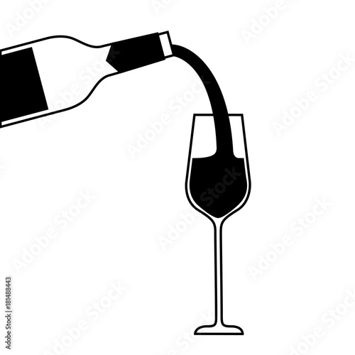 wine pouring from bottle in wine glass