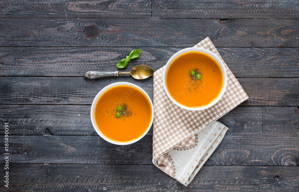 Homemade Pumpkin Soup on rustic wooden background, free space for text. Homemade Pumpkin Soup on rustic wooden background, free space for text.