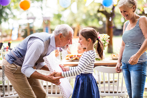 Family celebration or a garden party outside in the backyard.