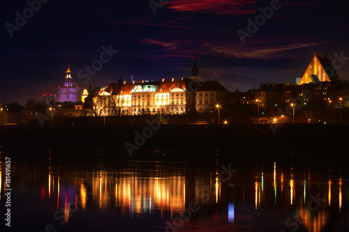 Panorama of Warsaw at night - a view over the Vistula River at the Royal Castle