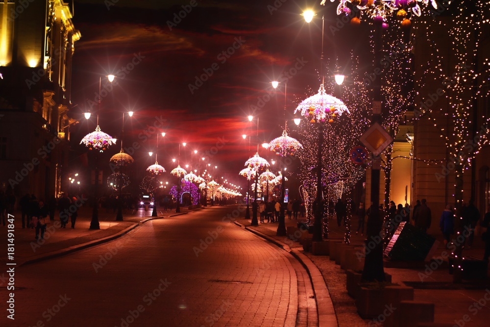 Fototapeta premium Panorama of Warsaw at night - view of Nowy Swiat street in Christmas decorations