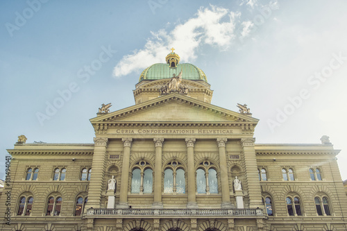 Bern, Switzerland - October 30, 2017: The Federal Palace, which is the seat of Federal Parliament (Swiss Federal Assembly), is located in a large building which dominates this part of the city.