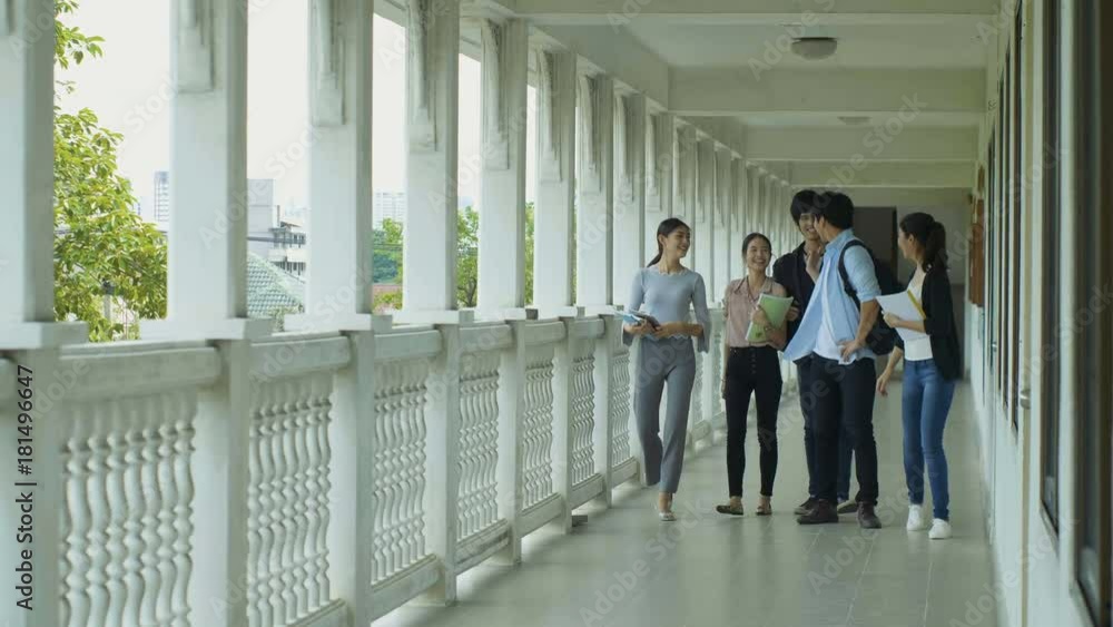 Asian College students are chatting after finish class Asian College students are chatting after finish class