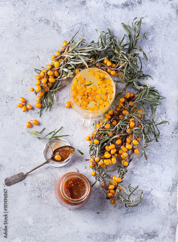 Tea with buckthorn berries photo