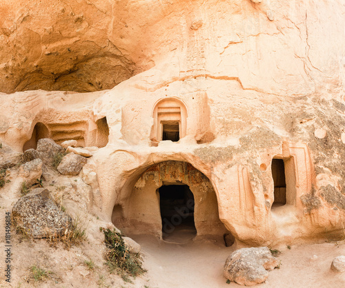 Cave town and rock formations in Zelve Valley, Cappadocia, Turkey photo