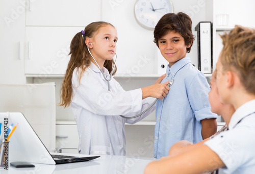Nurse girl in medical center with stethoscope