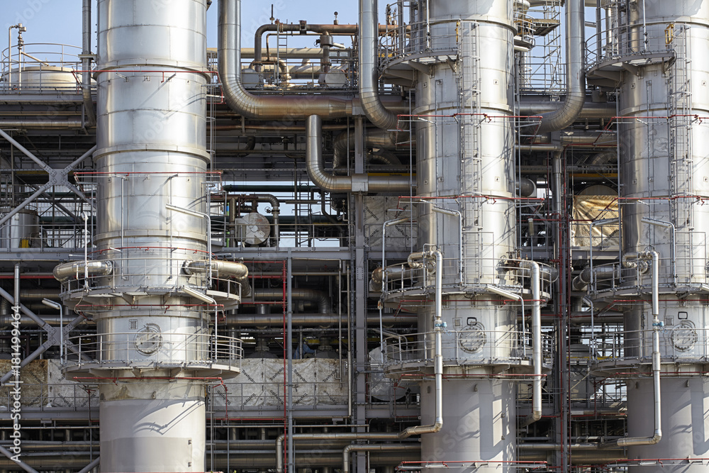 pipelines and destillation tanks of an oil-refinery plant pipelines and destillation tanks of an oil-refinery plant
