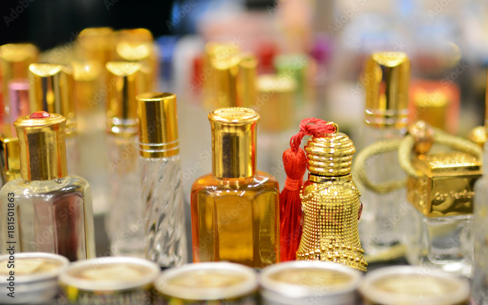 Glass perfume bottles based oils. A Bazaar, market. Macro. Glass perfume bottles based oils. A Bazaar, market. Macro.