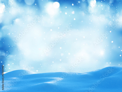 Winter background with snow and blurred bokeh.Merry Christmas and happy New Year greeting card with copy-space