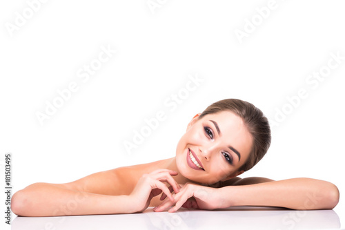 Beauty Woman face Portrait. Beautiful model Girl with Perfect Fresh Clean Skin color lips purple red. Youth and Skin Care Concept isolated on a white background