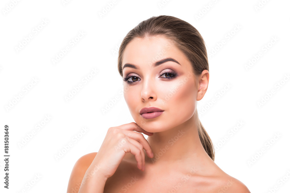 Beauty model girl with perfect make-up looking at camera isolated over white. Portrait of attractive young woman with blond hair on white background. Beautiful female face with clear fresh skin Beauty model girl with perfect make-up looking at camera isolated over white. Portrait of attractive young woman with blond hair on white background. Beautiful female face with clear fresh skin