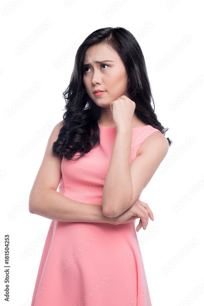 Asian young beautiful woman thinking and standing over white. Asian young beautiful woman thinking and standing over white.