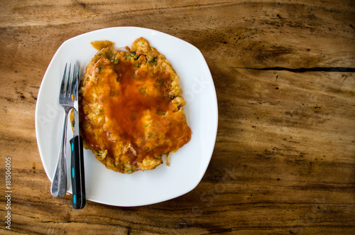 Fu yung hai, a popular Chinese Indonesian dish with copy space on the right (in China called Egg foo young)