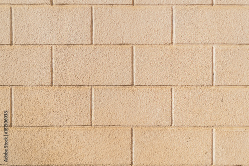 Big beige brick wall as a background, texture