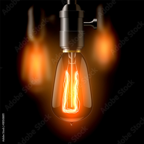 Old incandescent lamp, teardrop shaped. On a dark background. Creates a cosiness. eps 10