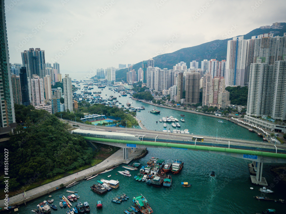 Aerial Top View of The Aberdeen Bay and the buildings on two sides of the harbour in Hong Kong.