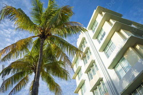 Classic 1930s art-deco era architecture and palm trees on Ocean Drive, Miami Beach.
