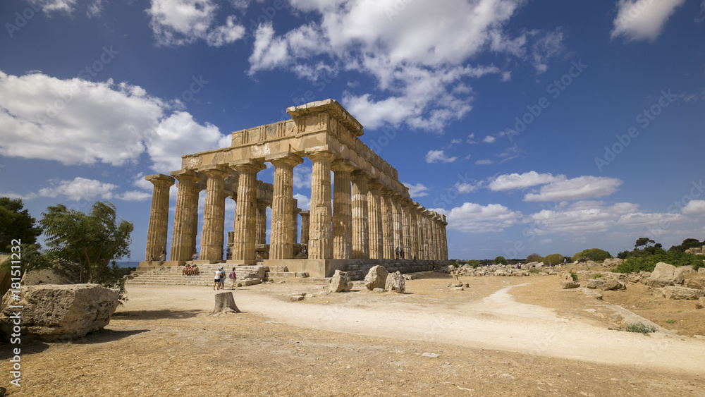 Some tourists visiting the ancient Greek temple in Selinuntea, Sicily, Italy.