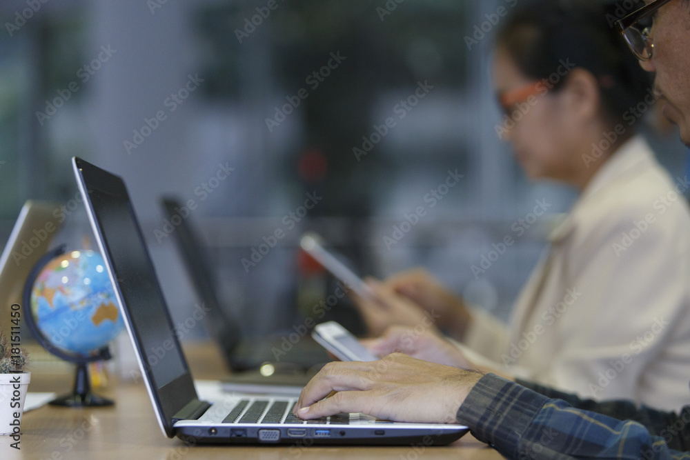 Business people working in the office desk, computer desk and office documents.