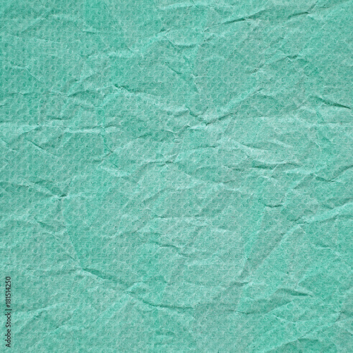 Green crumpled paper with tissue pattern background