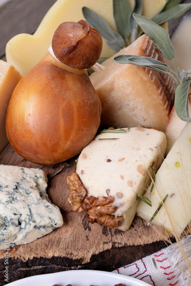 Fototapeta premium Various types of cheese on the table
