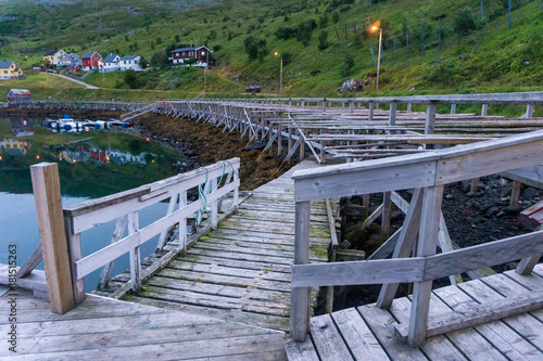 Berth and Wooden rack for drying code on the island Soroya, Norway