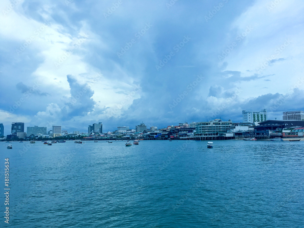 Landscape of sea with boat and downtown and building and blue sky, The view of cityscape and blue sea