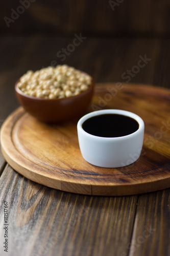 Beautiful soy sauce in a white ceramic bowl