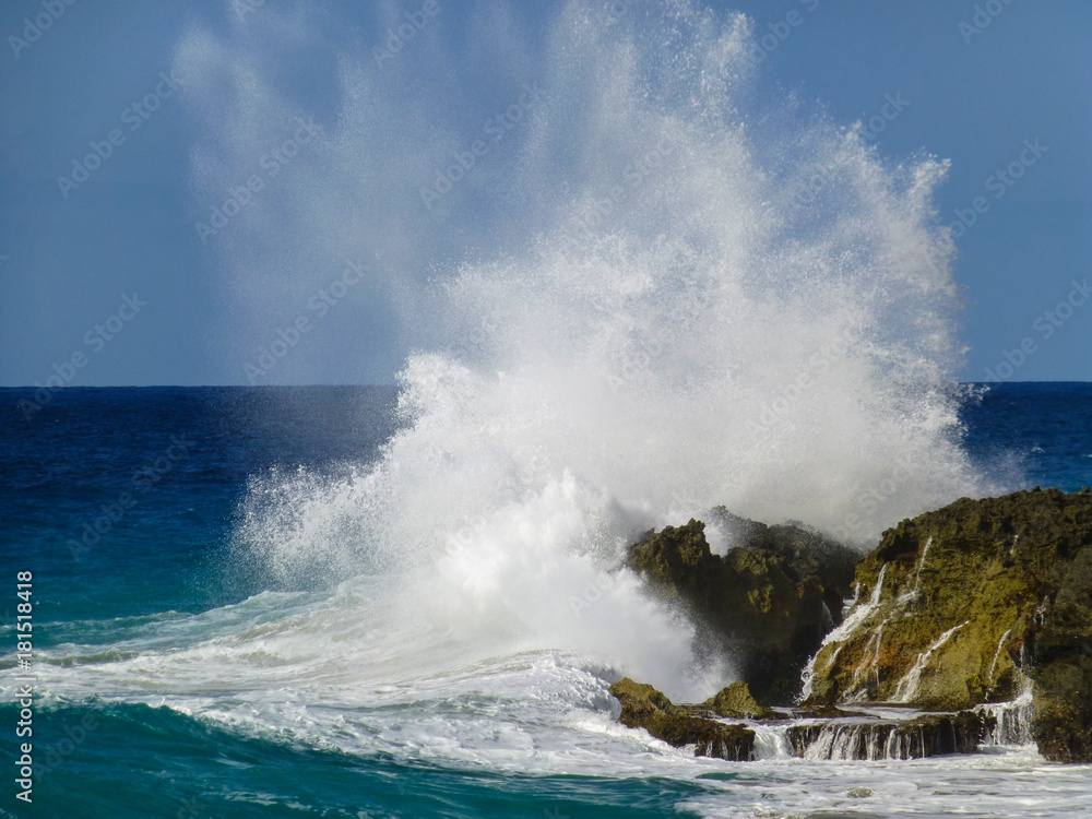 Big wave hit  the rocks in Domenican Republic.