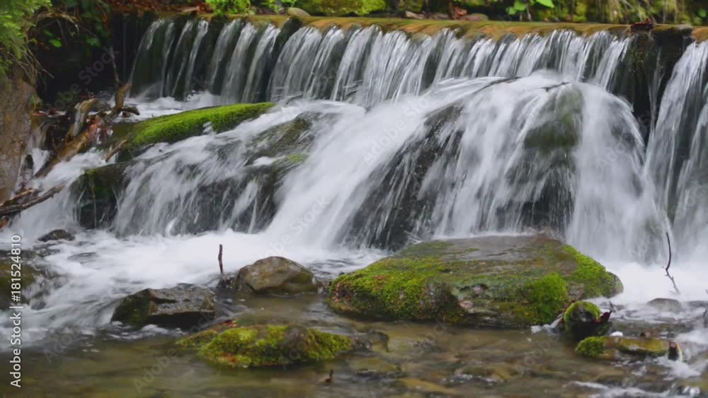 Beauty waterfall in summer mountains Beauty waterfall in summer mountains