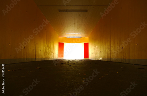 Underpass. A light at the end of the tunnel. A concept image representing hope, faith, endurance, perseverance, freedom, depression, and similar ideas. photo