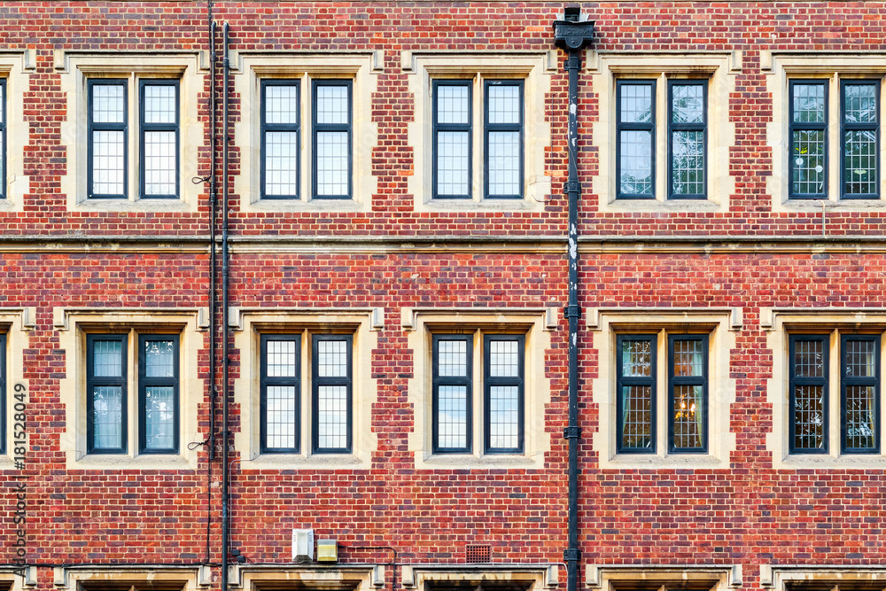 Fototapeta premium Facade of brick mansion block in London