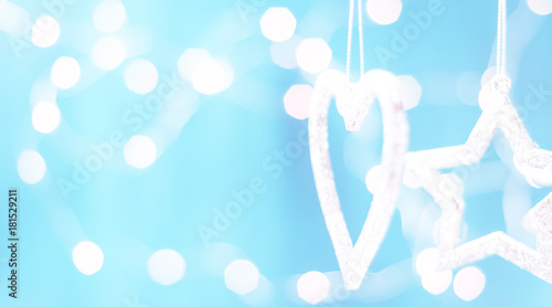 Christmas card with Christmas decorations on a sparkling blue background