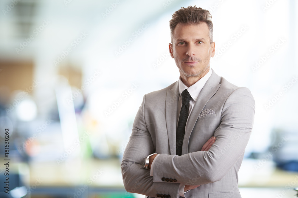 Businessman standing in the office Businessman standing in the office