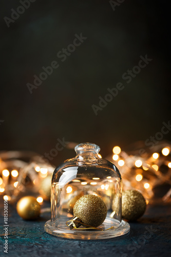 Golden christmas balls on bokeh background