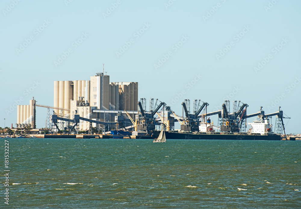 Bulk carrier ships near the terminal.