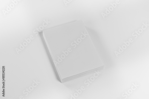 Mockup of magazine, poster, A4 brochure, catalog or flyer isolated on white background. Blank page top view for use in design, mockups and simulations.