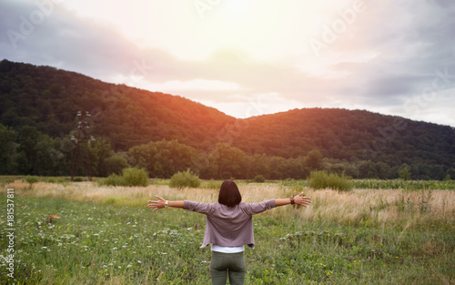 girl in the open air, looking at the Ukrainian Carpathians