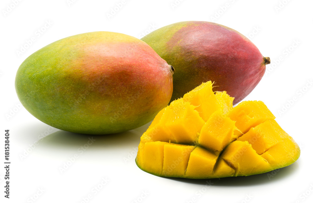 Sliced mango hedgehog shape isolated on white background one half and two whole. Sliced mango hedgehog shape isolated on white background one half and two whole.