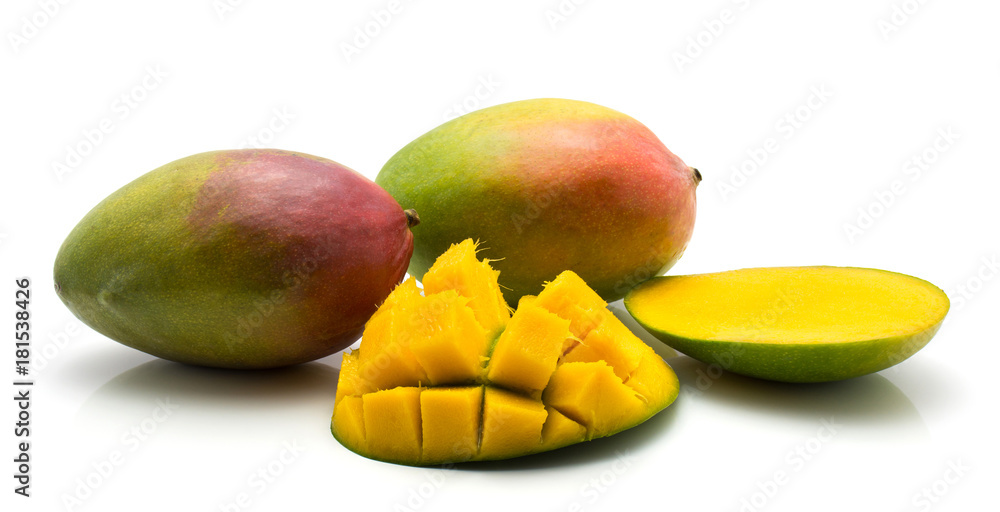 Sliced mango hedgehog shape isolated on white background two whole two halves. Sliced mango hedgehog shape isolated on white background two whole two halves.
