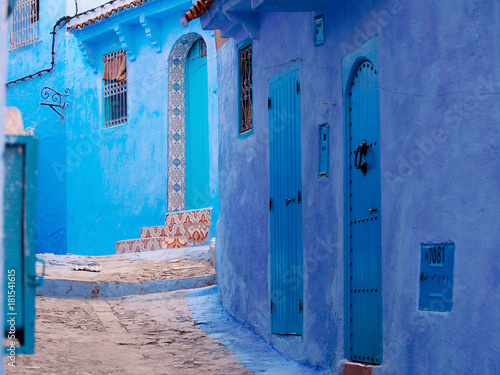 The gorgeous blue streets and blue-washed building of Chefchaouen - the moroccan blue city - amazing palette of blue and white buildings © Natalia Schuchardt